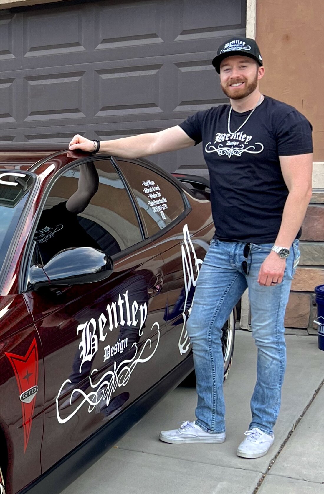 Robby Bentley beside a Bentley Design custom GTO